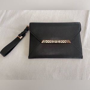 Like new Stella and Dot black clutch